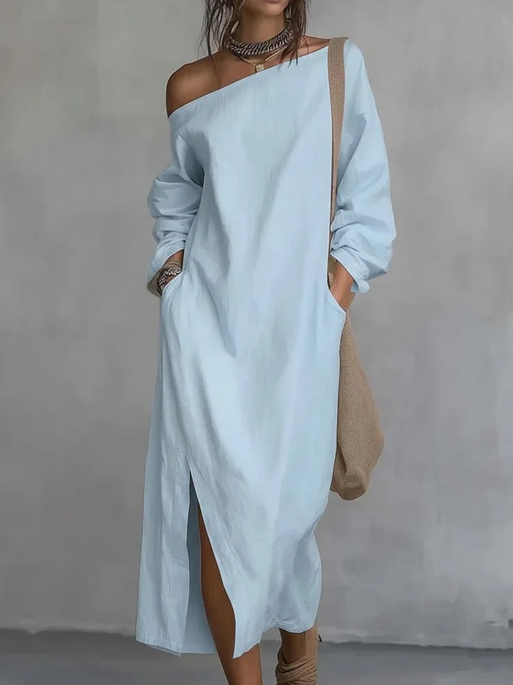 Stylish women's one-shoulder flowy maxi dress, a comfortable sleeveless beach or vacation dress for warm weather.