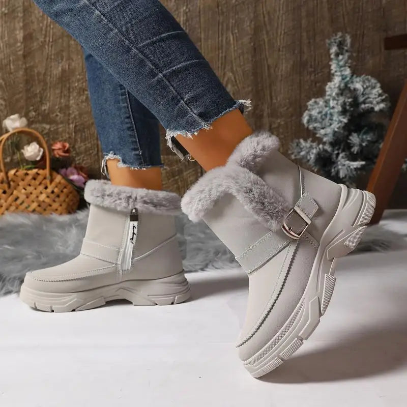 Warm women's gray boots with faux fur lining and stylish buckle accents