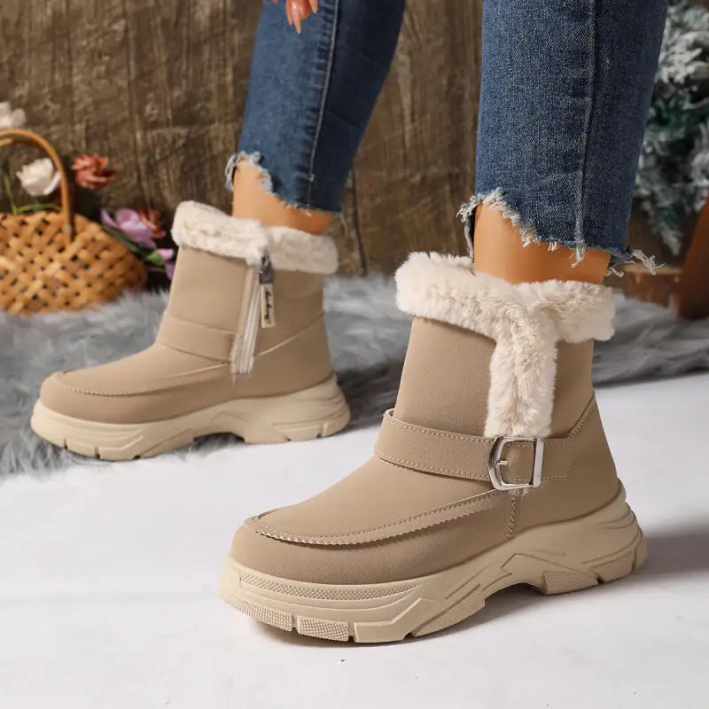 Women's gray winter boots with decorative buckles & soft faux fur interior, top view
