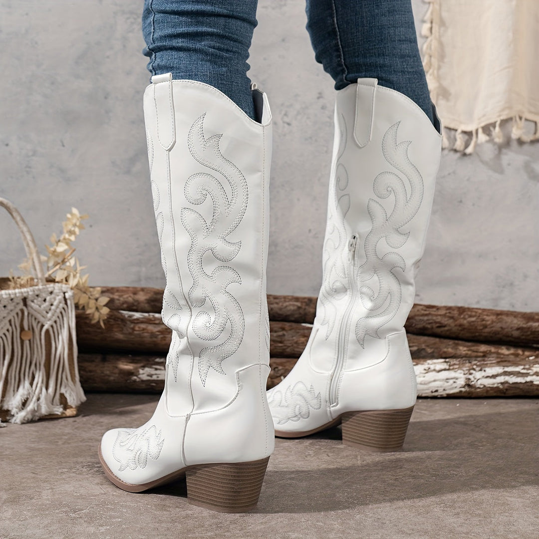 Women's knee-high block heel cowboy boots. Classic western style with pointed toe.
