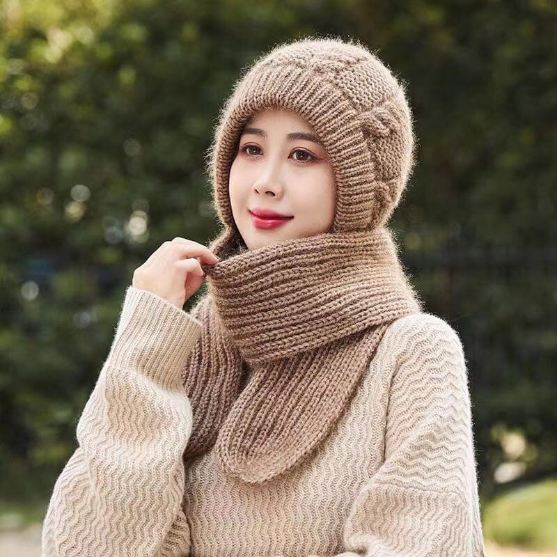 Flat lay of a women's knit beanie & scarf, highlighting their coordinated design for winter
