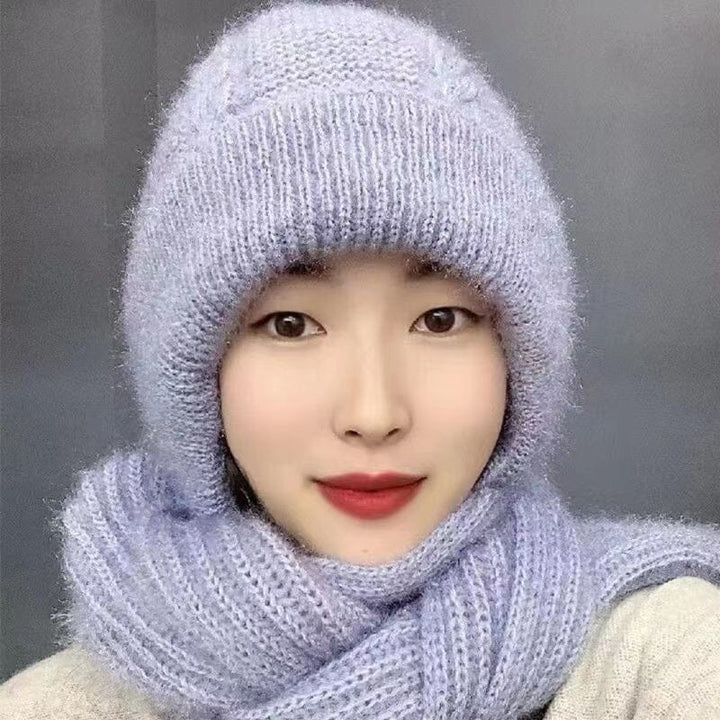 Close-up of a knitted scarf from a women's winter set, featuring a soft and warm fabric