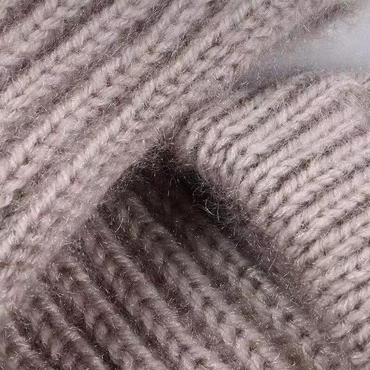 Soft knit beanie for women, showcasing its stretchable material and comfortable fit