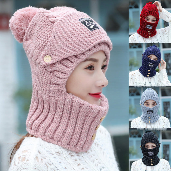 Women's knitted beanie in a vibrant color with ear protection, perfect for cold weather.