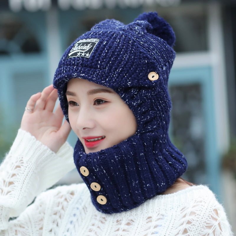 Detail of the knitted pattern on a women's beanie, emphasizing its quality and ear warmth.