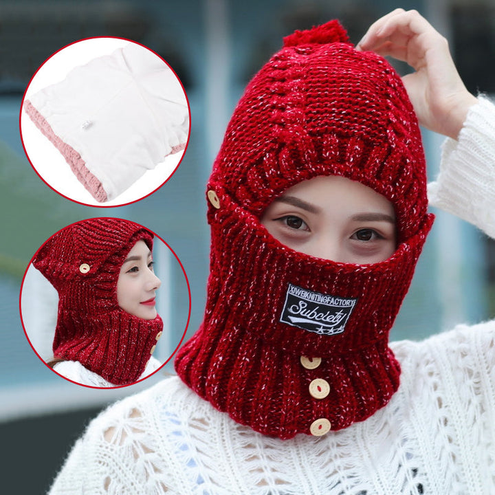 Close-up of a cozy women's knitted beanie hat, showing fleece lining detail for warmth.