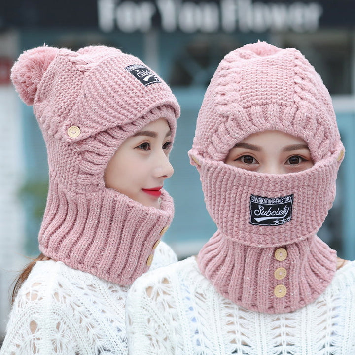Stylish women's cold weather beanie, thick knit texture, and full ear coverage.