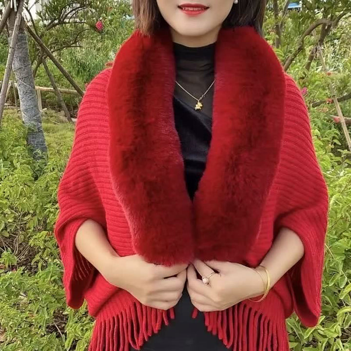 Winter fashion essential: Women's thickened knitted shawl, providing both warmth and elegance.