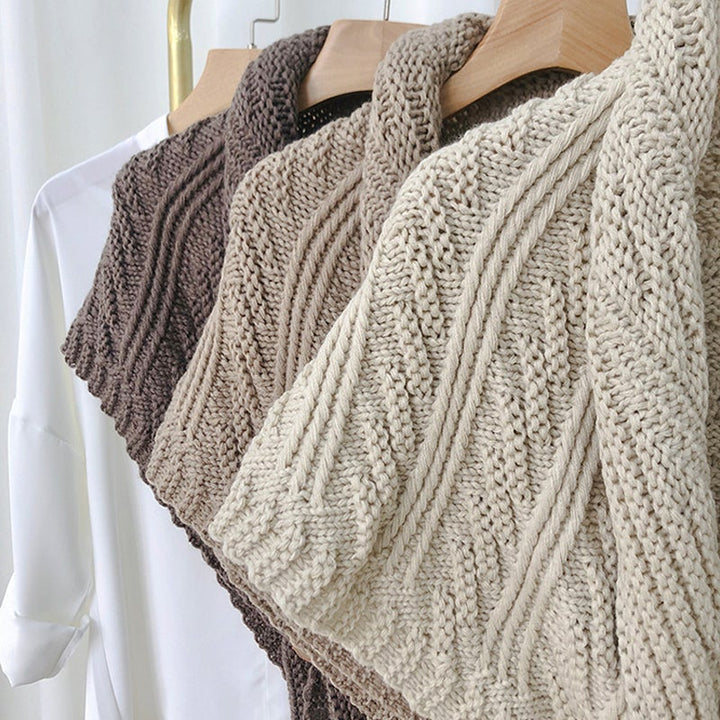 Detail of the knit pattern on a women's triangle shawl, high-quality fabric