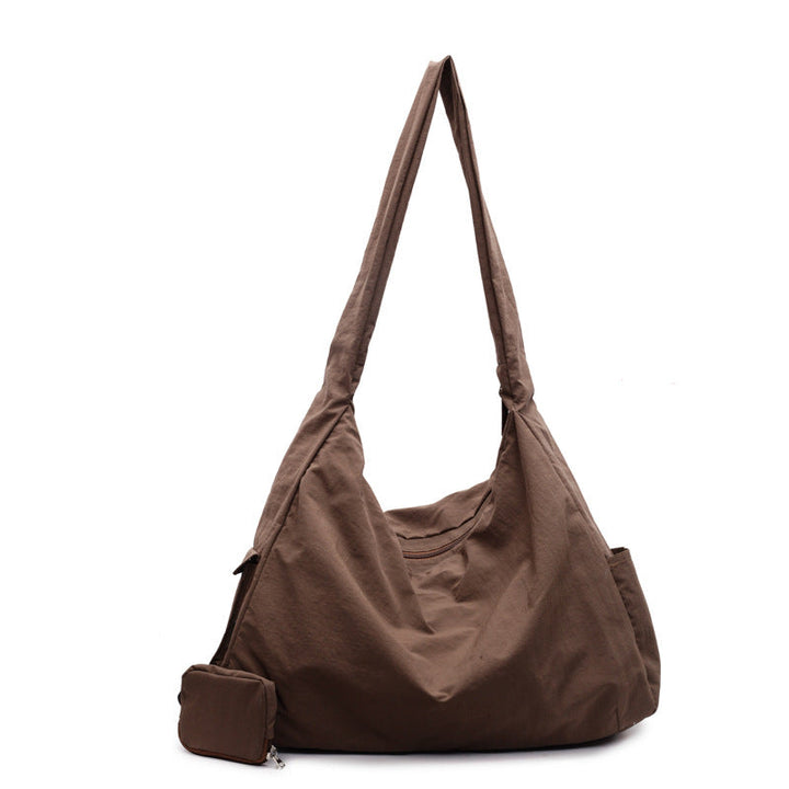 Chic women's large capacity shoulder bag, great for casual outings & essentials.