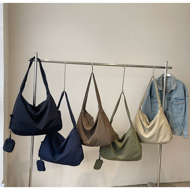 Versatile women's crossbody bag, ample storage for everyday needs.