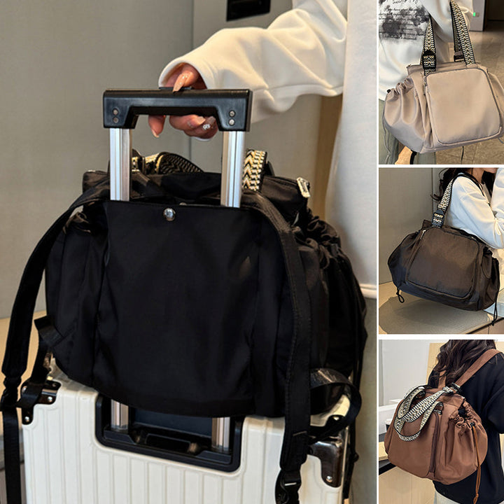 Women's large capacity convertible tote backpack in black nylon, front view