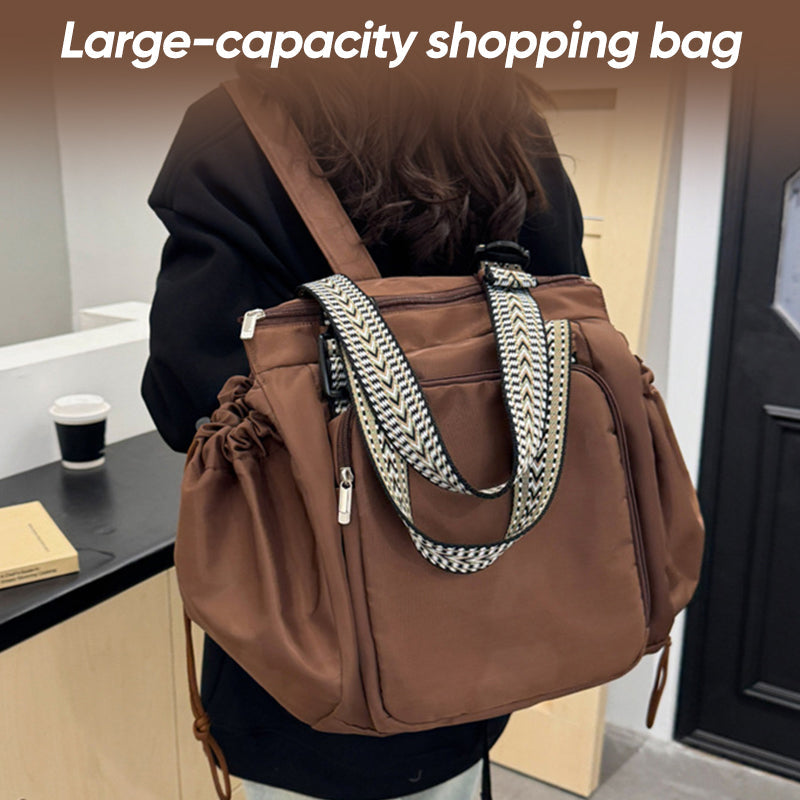 Women's large black nylon tote backpack, perfect as a versatile diaper bag