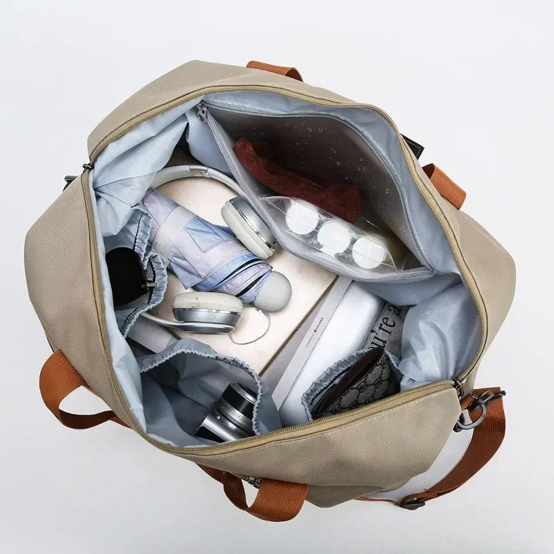 Spacious women's fitness travel bag featuring a wet-dry compartment & shoe storage for gym essentials.
