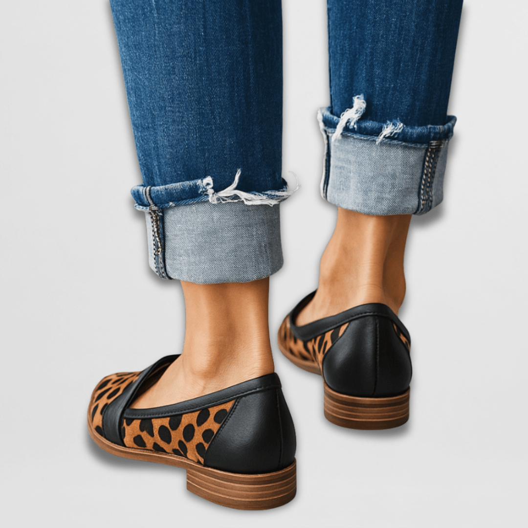 Close-up of a women's leopard print flat loafer, showcasing the comfortable design and trendy pattern.