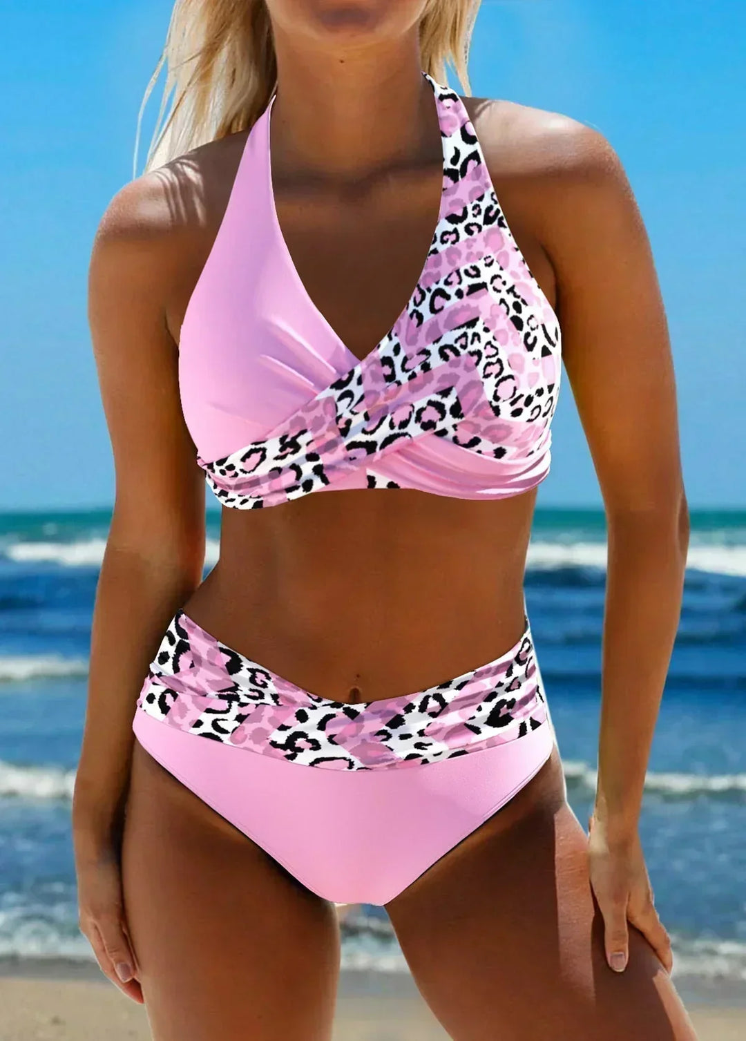 Flattering women's leopard print high waist bikini with textured halter top, ideal for poolside style.