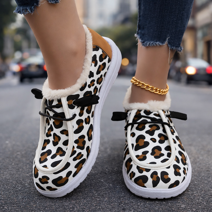 Women's leopard print lace-up walking shoes with cushioned sole, perfect for comfortable wear.