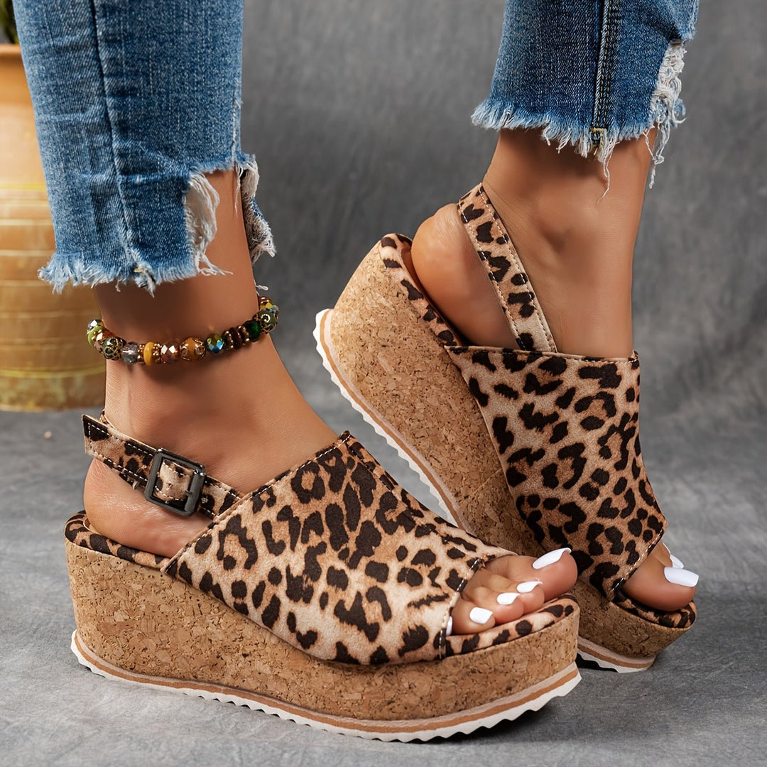 Boho chic leopard print platform wedge sandals for women, open toe, ideal for festivals and summer casual outfits.