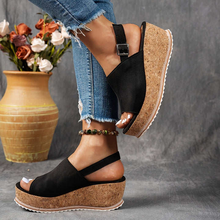 Women's comfortable open-toe leopard print platform wedge sandals, featuring a stylish buckle strap for summer.