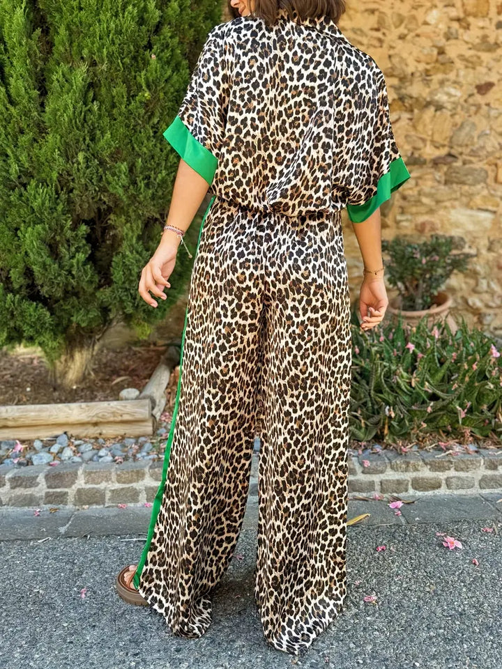 Trendy women's animal print wide leg jumpsuit with a deep v-neck. Comfortable & stylish one-piece fashion.