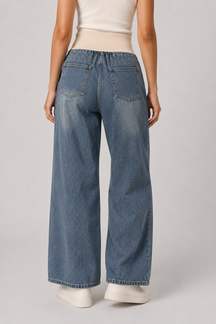 Effortless women's fashion: light blue wide leg loose fit jeans, high waist denim for relaxed, comfortable style.