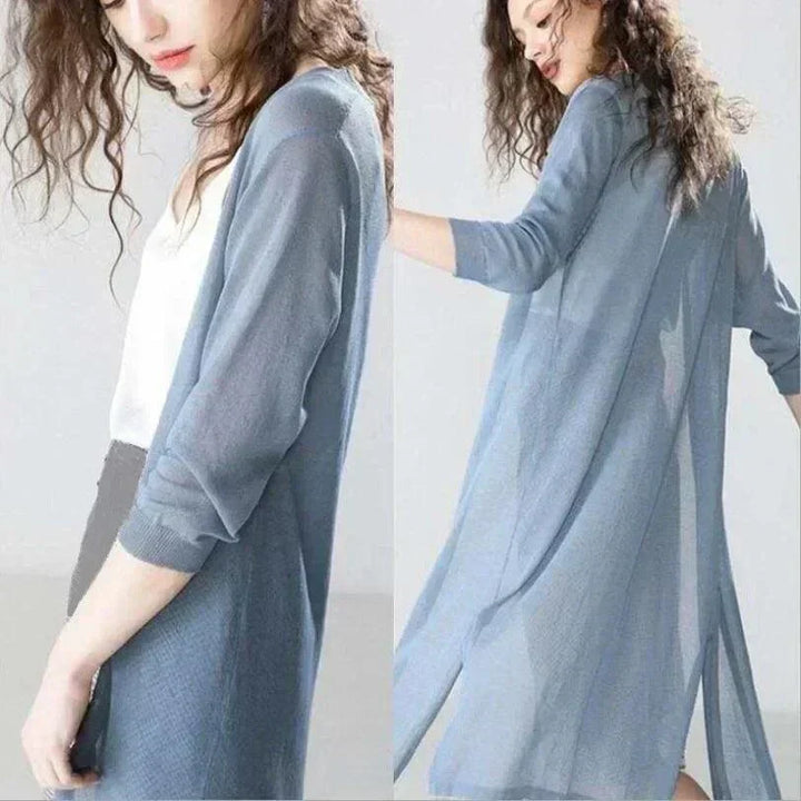 Stylish women's long vest in a light fabric, ideal for spring fashion or summer layering. A comfortable and chic piece.