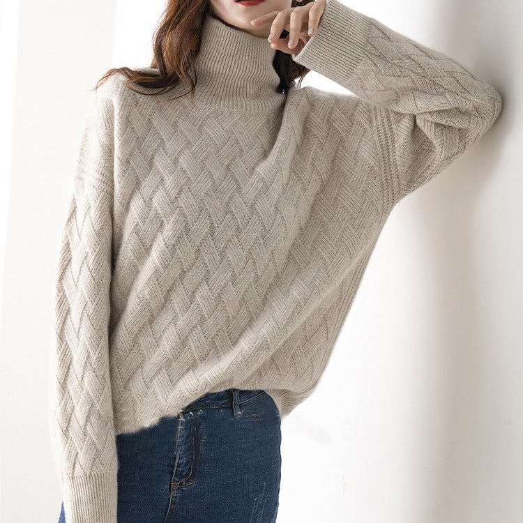 Elegant women's black knit turtleneck sweater with long sleeves, ideal for versatile spring fashion.