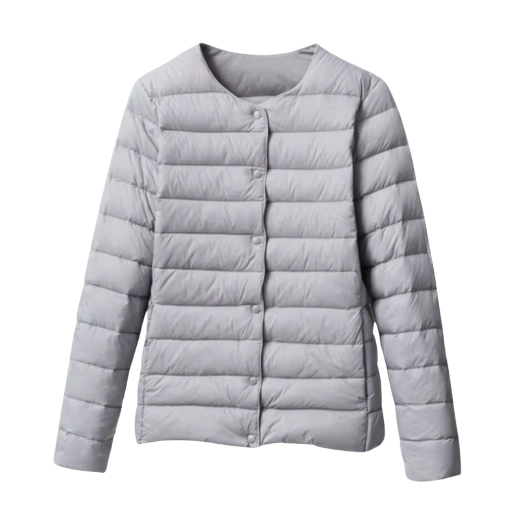 Back view of a women's quilted jacket, showcasing the fit and casual style for spring outerwear.