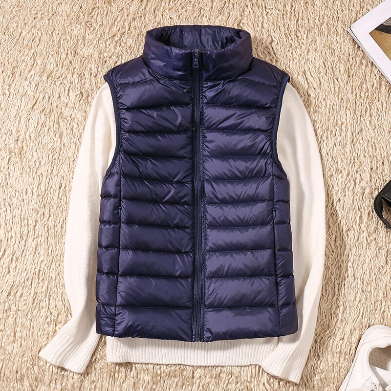 Lightweight women's zip vest, perfect as a seasonal jacket or a stylish layering piece.