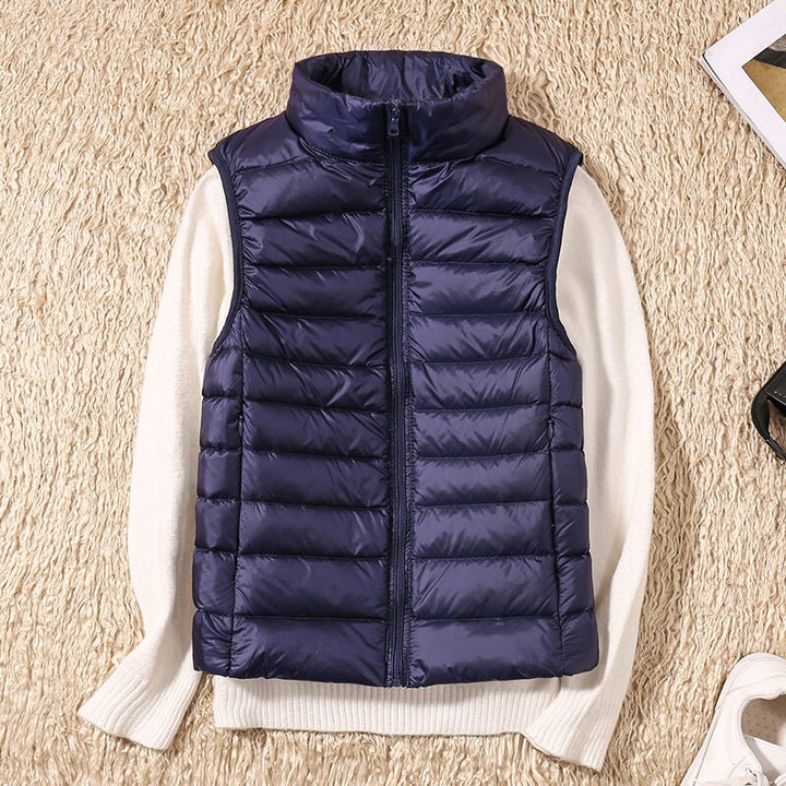 Lightweight women's zip vest, perfect as a seasonal jacket or a stylish layering piece.
