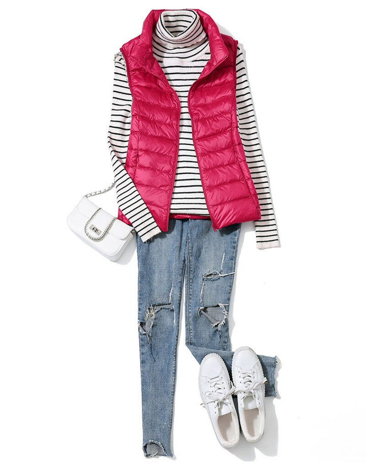 Women's fashionable quilted outerwear vest, offering warmth without bulk. Travel ready.