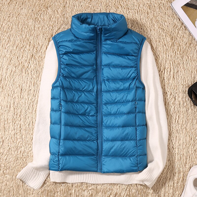 Stylish women's quilted vest, a versatile sleeveless jacket for casual or travel wear.