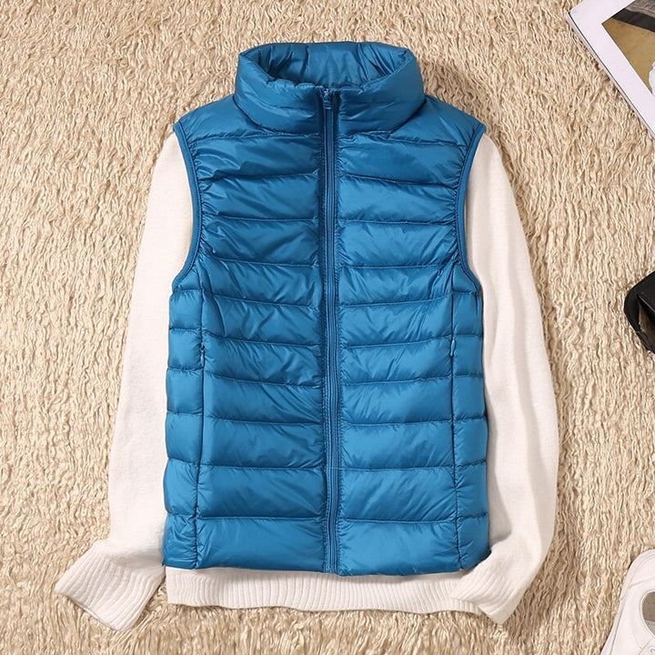 Stylish women's quilted vest, a versatile sleeveless jacket for casual or travel wear.