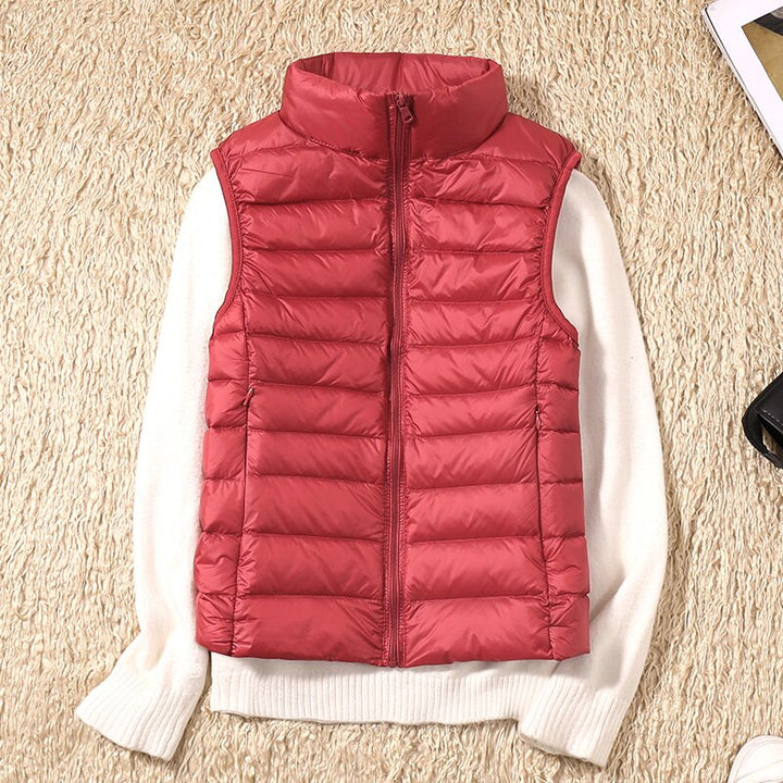 Women's sleeveless quilted jacket, a fashionable and practical zip vest for everyday wear.