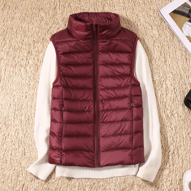 Chic women's quilted vest, a versatile outerwear piece designed for modern fashion.