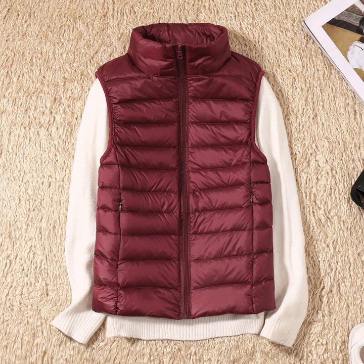 Chic women's quilted vest, a versatile outerwear piece designed for modern fashion.