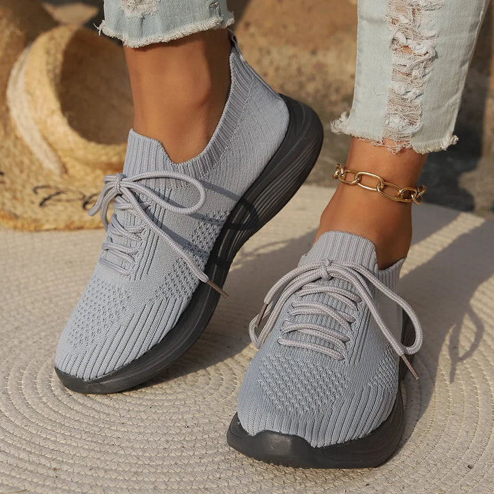 Comfortable women's lightweight ribbed sneakers with flexible fit. Perfect casual walking shoes for all-day wear.