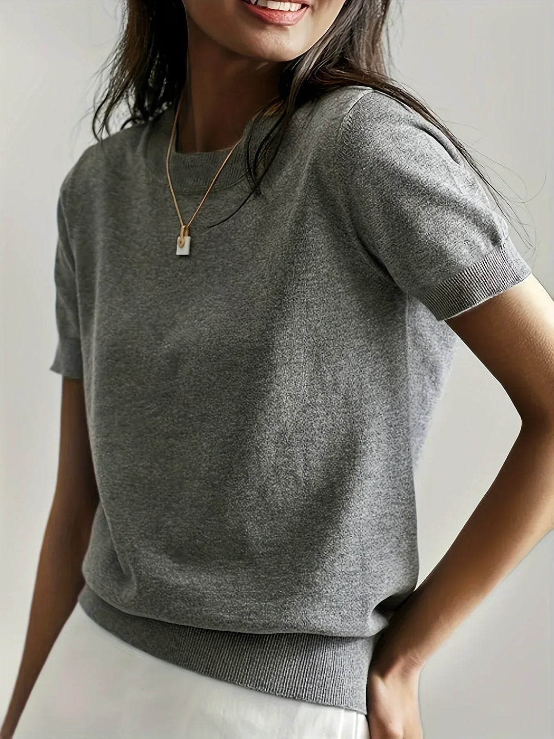 Women's lightweight short sleeve sweater, perfect for spring and summer fashion.