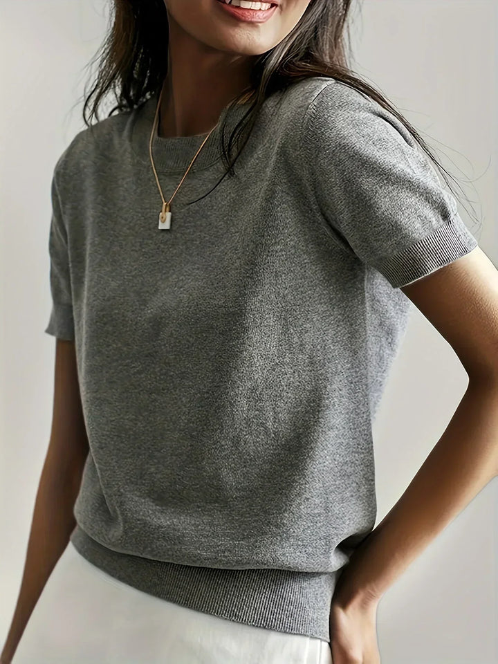Women's lightweight short sleeve sweater, perfect for spring and summer fashion.