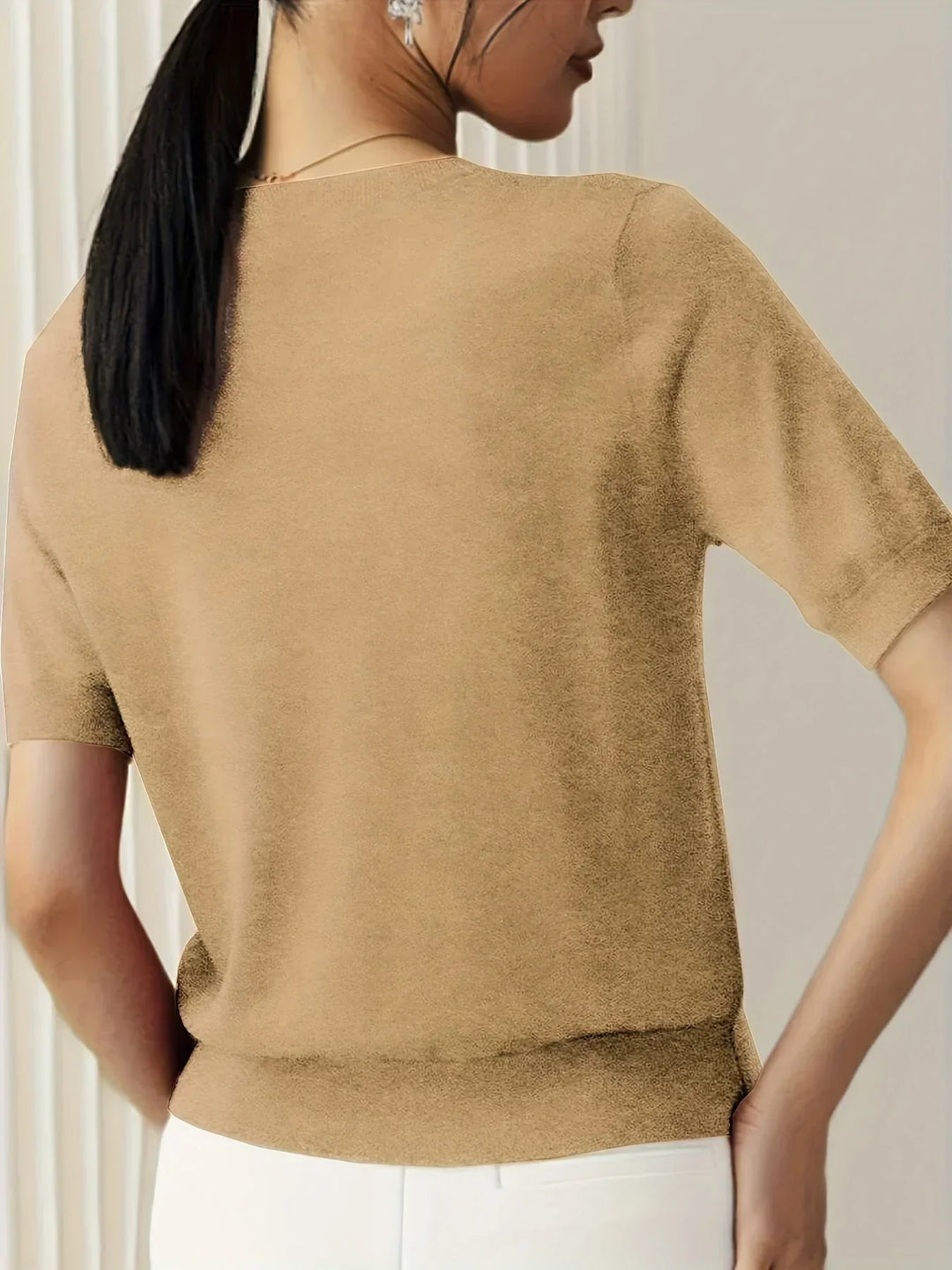 Versatile short sleeve women's pullover, lightweight & breathable for spring/summer layering.