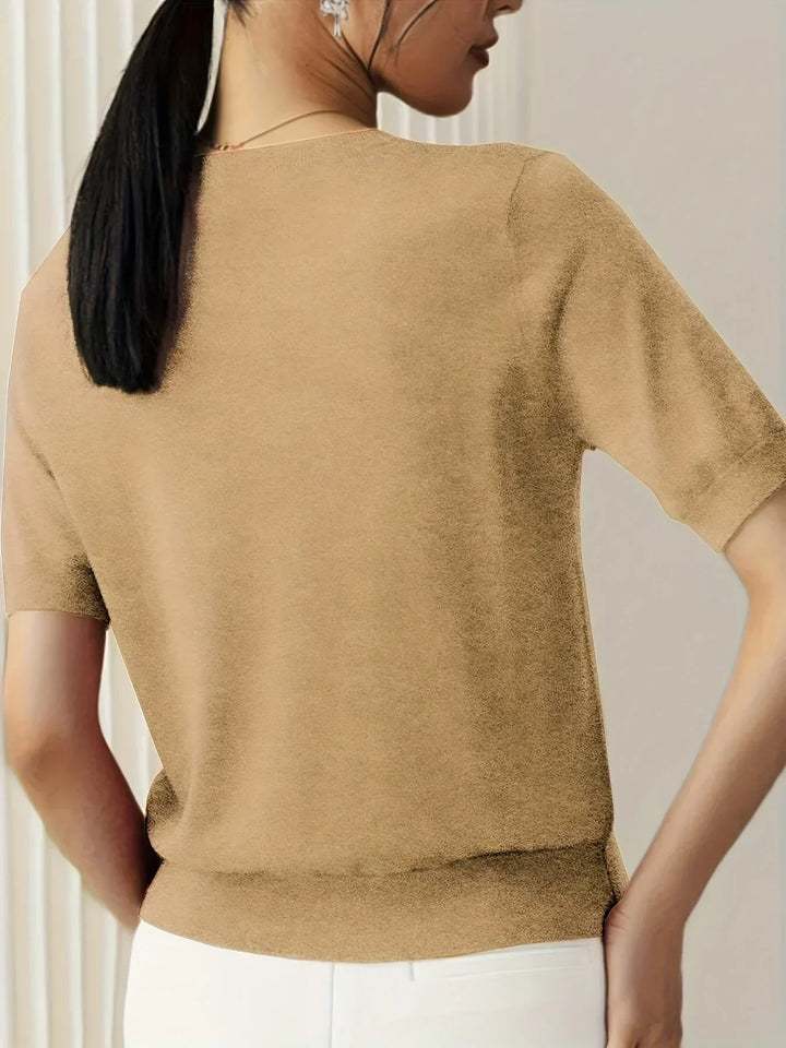 Versatile short sleeve women's pullover, lightweight & breathable for spring/summer layering.