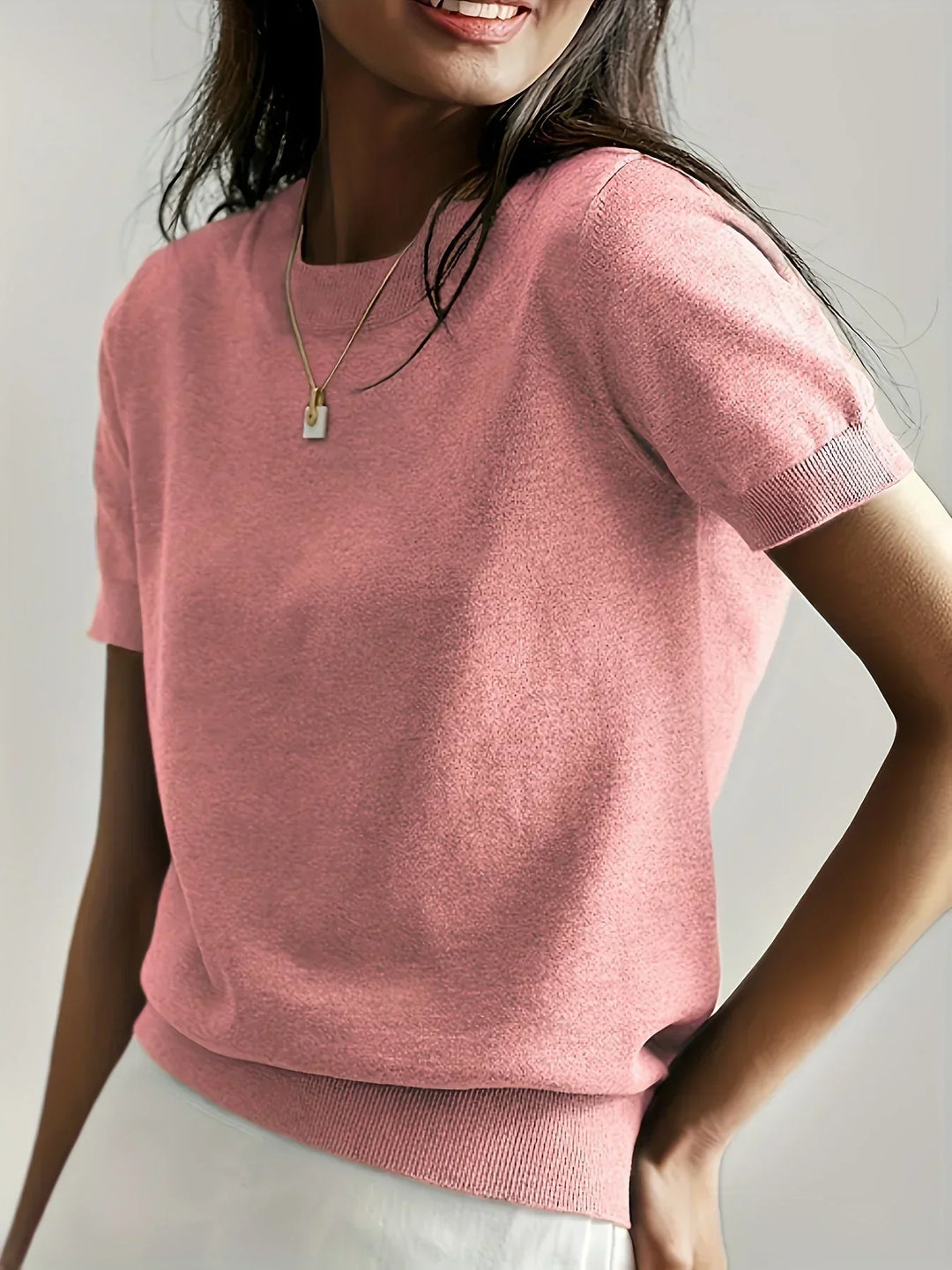 Relaxed fit short sleeve women's sweater, lightweight and comfortable for spring & summer casual style.