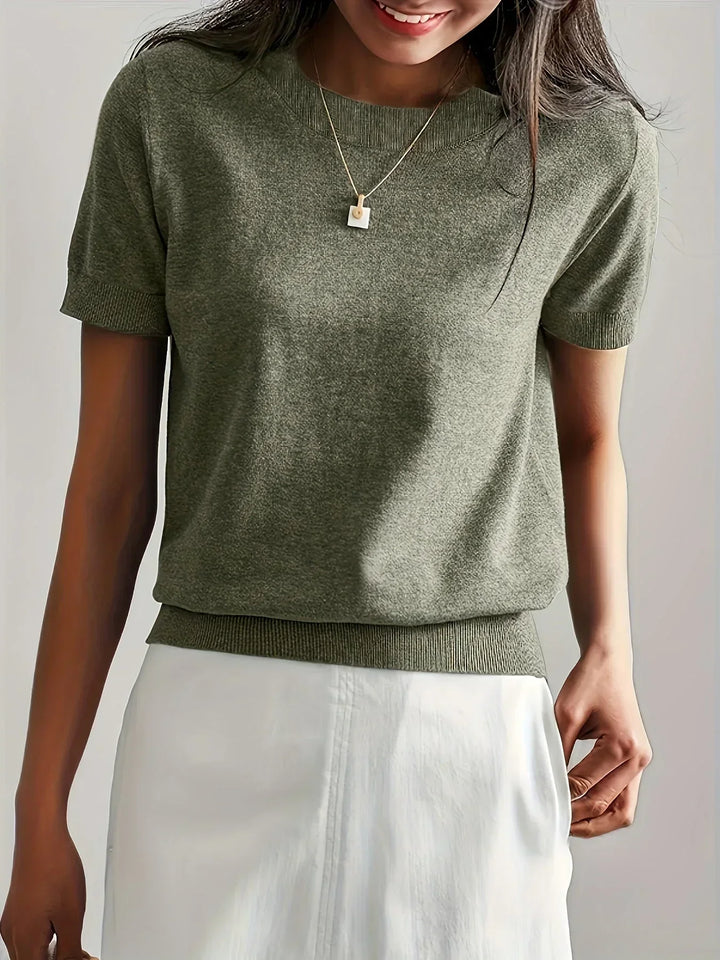 Chic women's short sleeve spring sweater, lightweight and breathable knit for seasonal style.