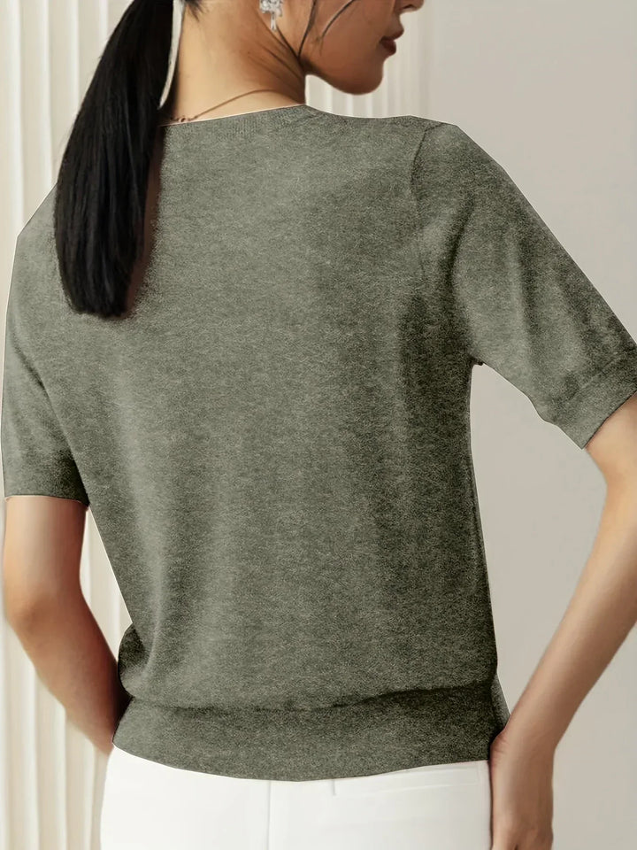 Cool women's short sleeve summer top, lightweight pullover for warm weather comfort.