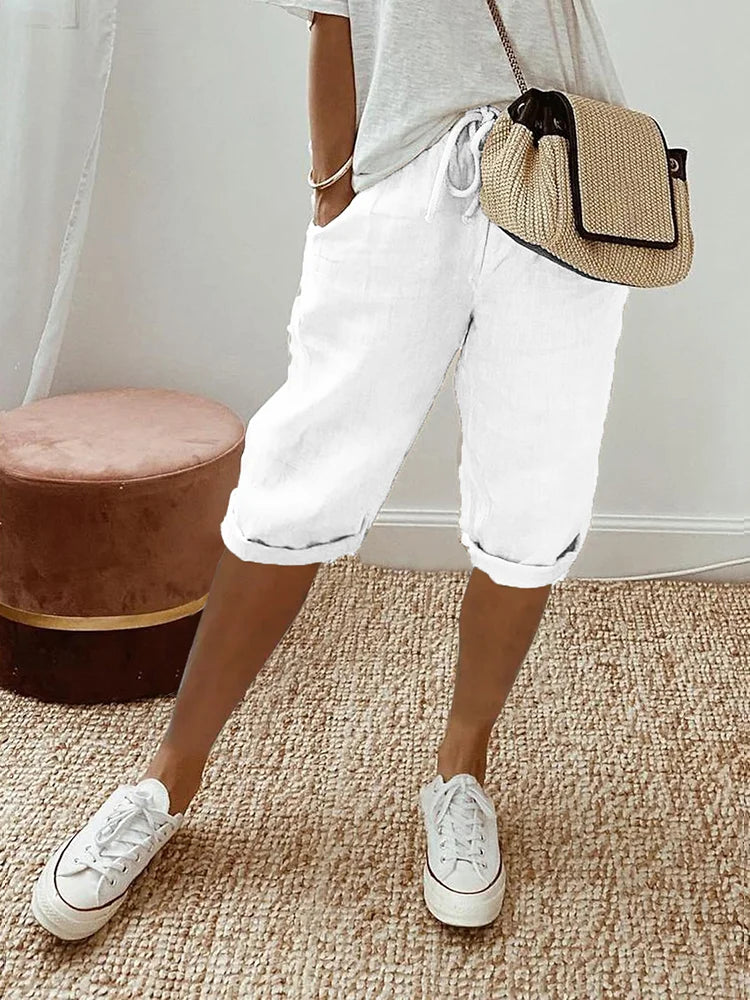 Lightweight women's summer shorts, perfect for warm weather. Features comfortable relaxed fit and drawstring.