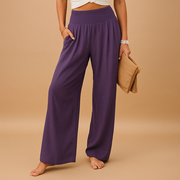 Breathable women's lightweight summer trousers. Loose fit & elastic waist ensure comfy, casual style for warm days.