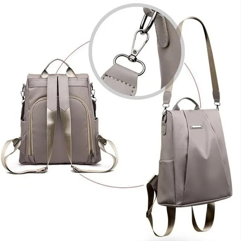 Close-up of a women's water-resistant nylon backpack, showing quality material & design details. Lightweight.