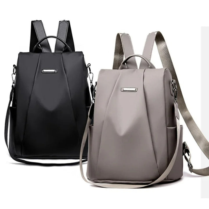 Versatile women's lightweight nylon backpack in a vibrant color, designed for water-resistant everyday carry.