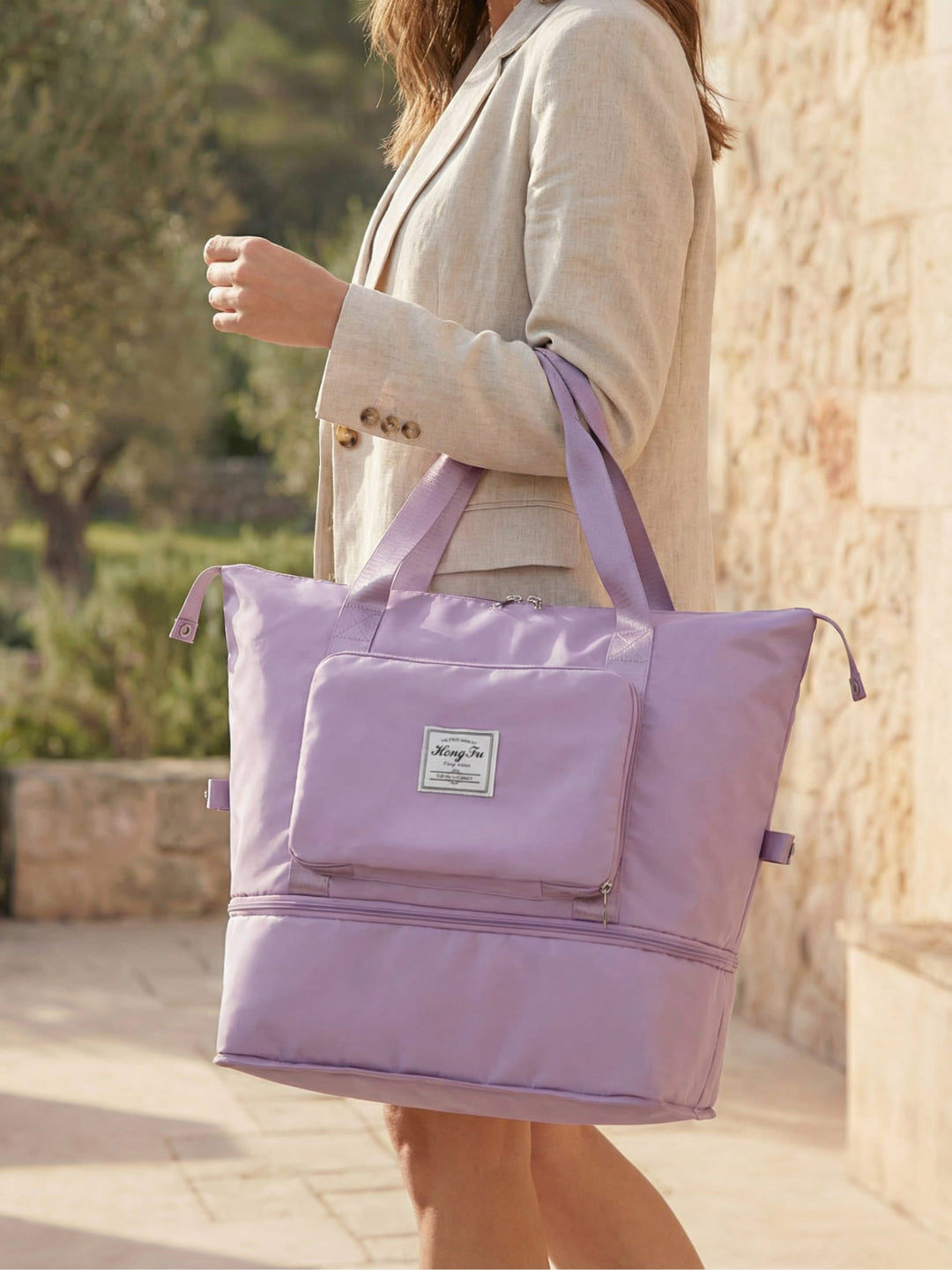Expandable weekender bag for women, waterproof & lightweight. Ideal travel carry-on duffel for weekend getaways.