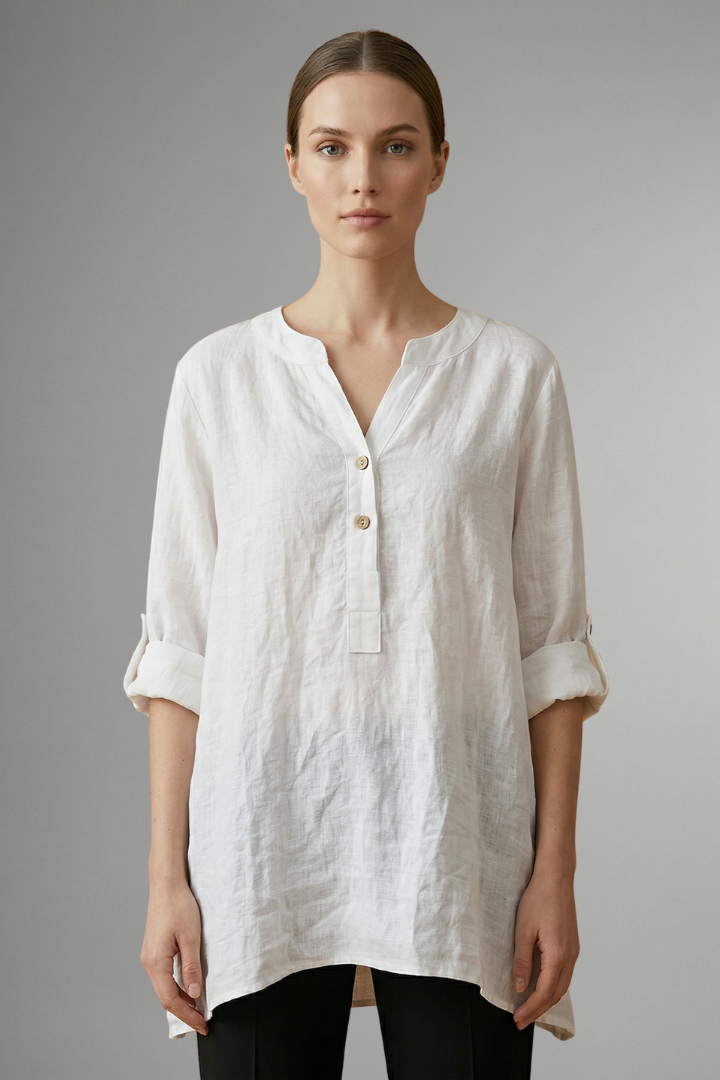 Versatile women's linen blouse with button closure & roll sleeves. V-neck, loose fit for casual summer fashion.